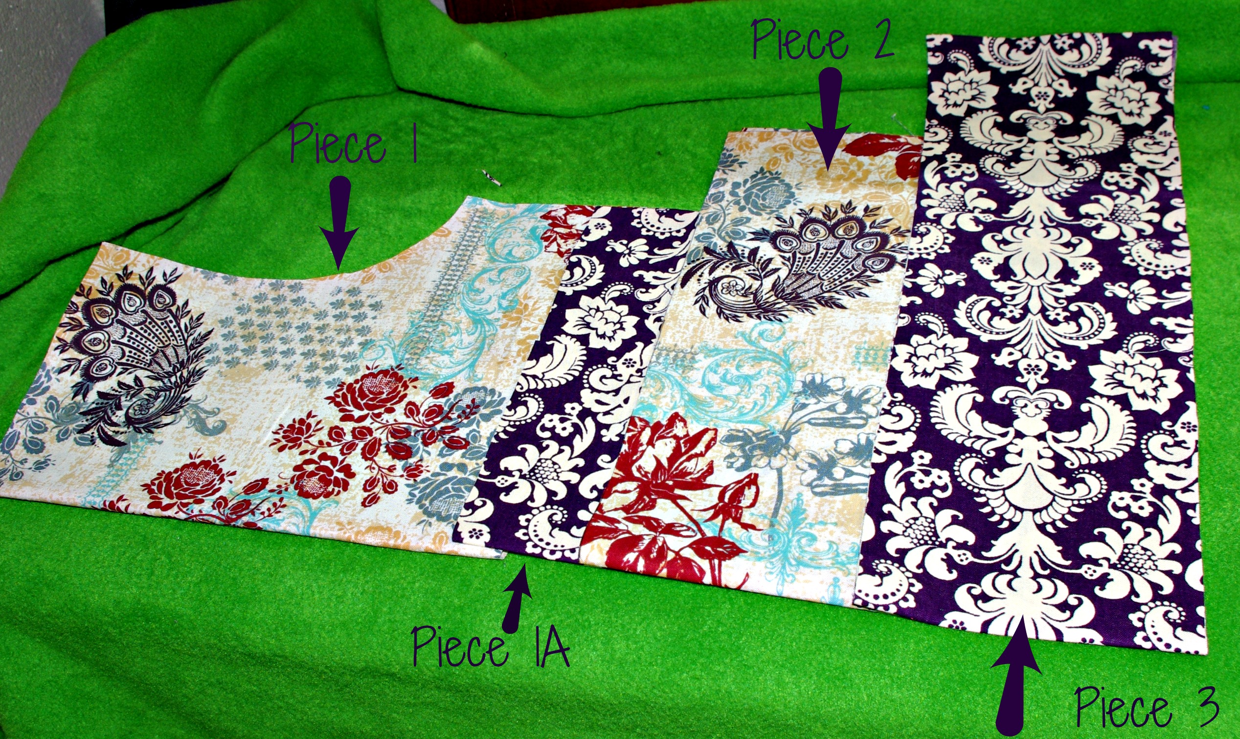 Pieces of fabric laid out for tiered pants.