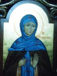 Icon Image of macrina dressed in blue holding left hand open and facing outward 